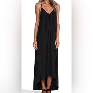 Pink stitch Elegant Black Maxi Dress high low bottom . Size 6. Silky material.